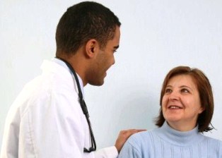 woman and doctor discussing health concerns