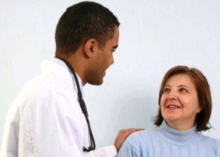 woman and doctor discussing health concerns